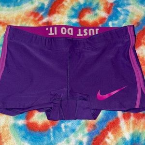 purple Nike shorts